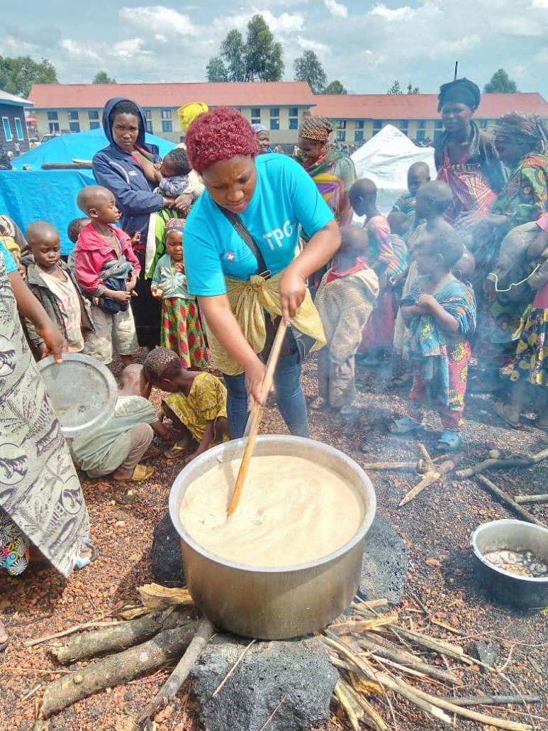 Children flock to the cook because the longed-for soup will soon be available